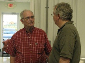Scott Marlow, Executive Director of RAFI, speaks to a farmer from Pitt County