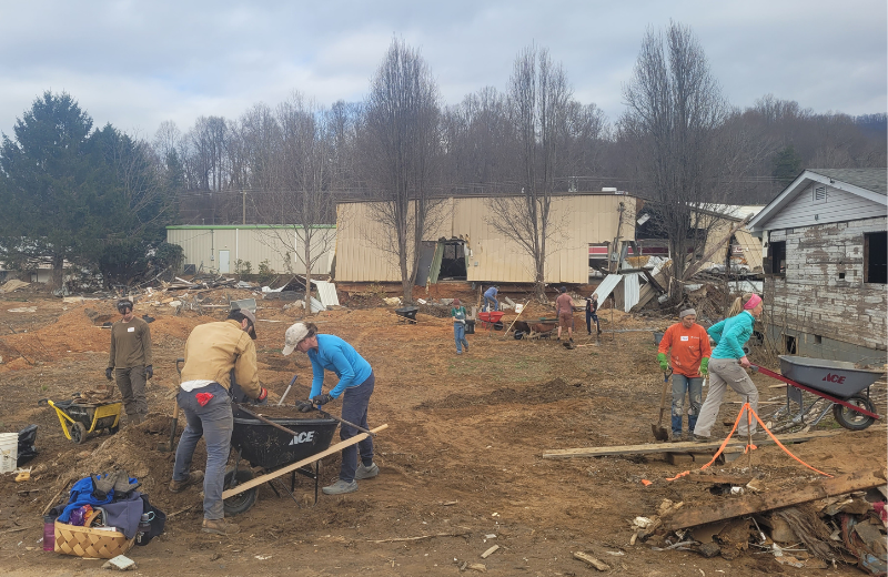 volunteers help with cleanup after Hurricane Helene